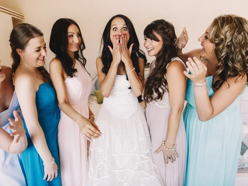 4 beautiful bridesmaids with the bride having fun at a Rhode Island wedding venue